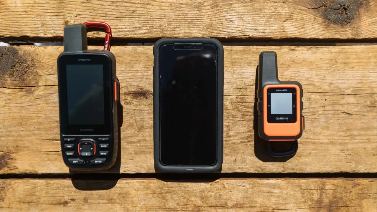 Close up on a plate of mashed potatoes, topped with baked pork chops with cream of mushroom soup, and a side of green beans.
