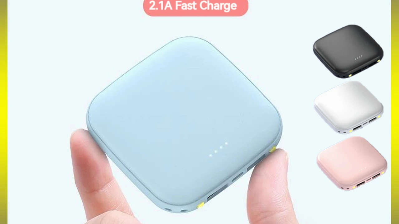 Close up on a plate of mashed potatoes, topped with baked pork chops with cream of mushroom soup, and a side of green beans.