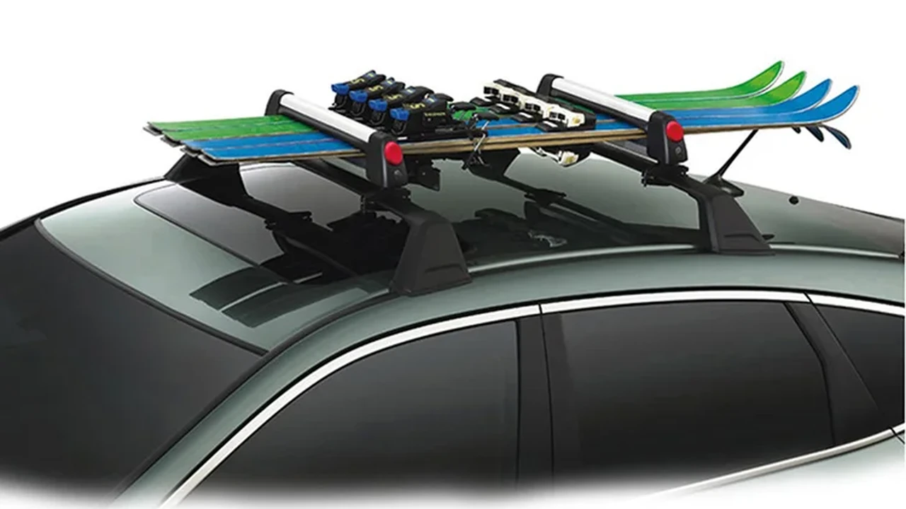 overhead view of corned beef sliced and on a platter with cabbage, potatoes, and carrots